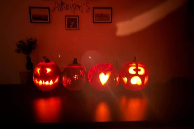 Lou Atkinson shared a photo of The Atkinson's spooky pumpkins, ready and lit for Halloween.