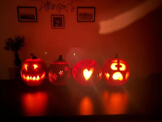 Lou Atkinson shared a photo of The Atkinson's spooky pumpkins, ready and lit for Halloween.