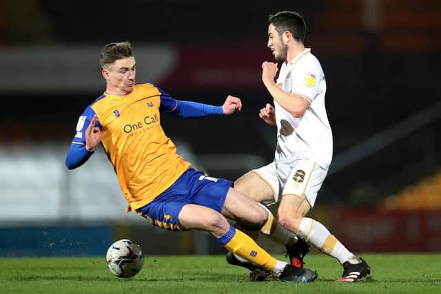 Mansfield Town are being tipped to see off Port Vale by the Supercomputer but not the bookies.