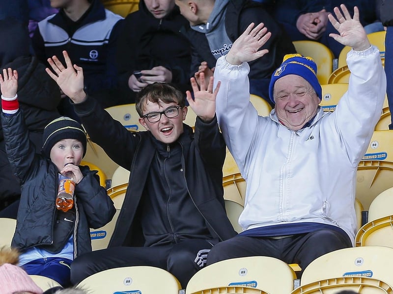 Mansfield Town fans ahead of the draw with Sutton United on 25 Mar 2023.