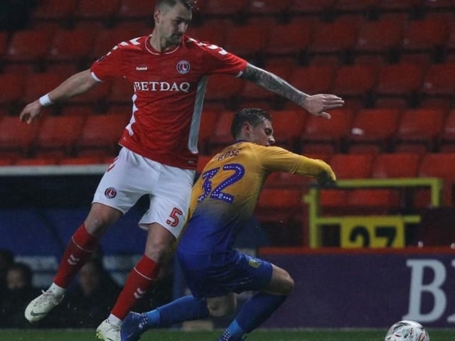 Danny Rose steals the ball from Patrick Bauer