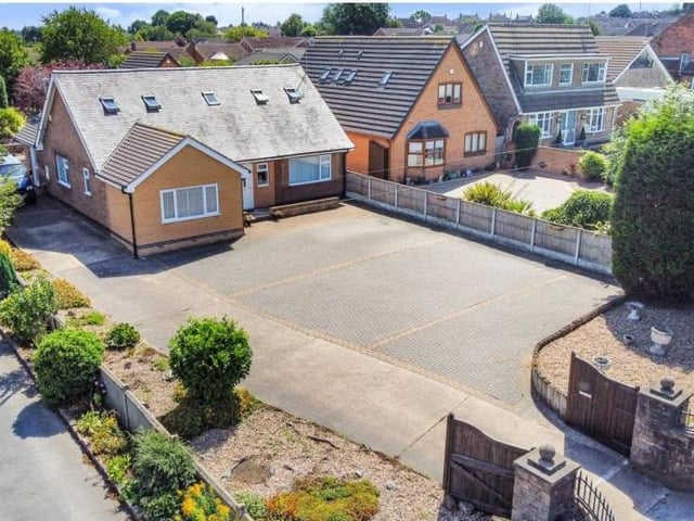 A more orthodox shot of the Abbott Road property, showing how inviting and impressive it is. The large, block-paved driveway provides plenty of space for off-street parking and even extends to the side of the house.