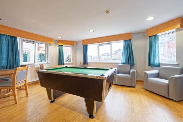 A cafe with a pool table is one of the many communal rooms at Cygnet Manor.