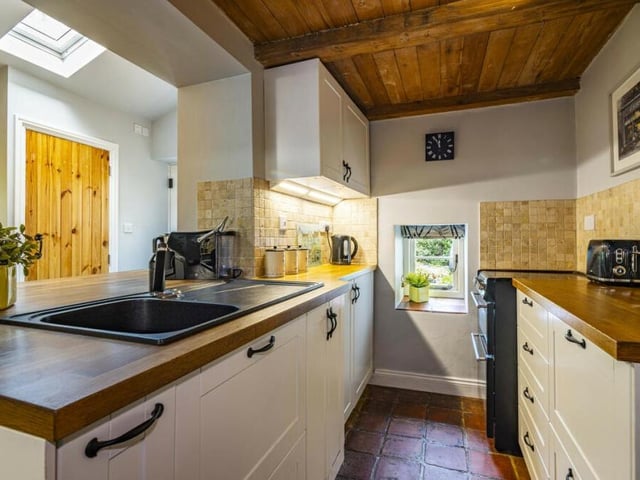 As you can see, the cottage-style kitchen is beautifully presented, with plenty of space for appliances.