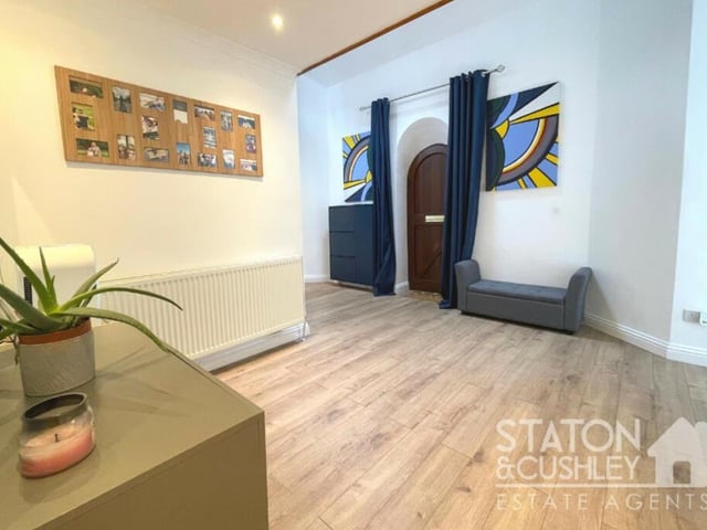 The front door leads into this entrance hall, with its laminate flooring and spotlights. Overlooking it is a spectacular gallery landing. More of that later.