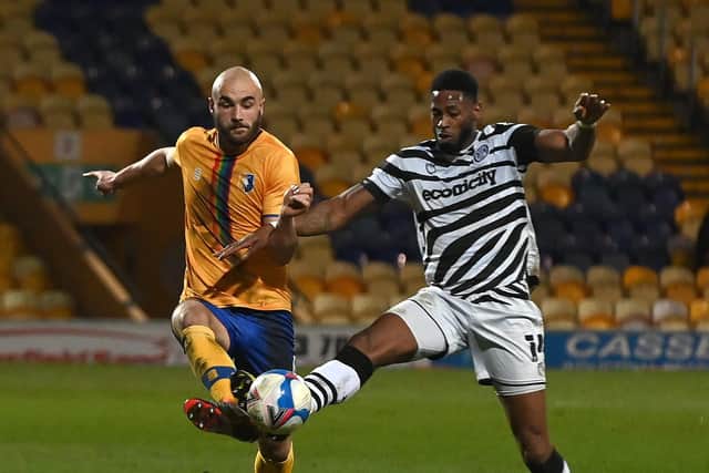 Mansfield's Farrend Rawson battles with Forest Green's Jamille Matt. Picture: Andrew Roe/AHPIX LTD
