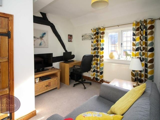 The third bedroom, which overlooks the side if the cottage, can be used as a home office or study. Even then, there is space for a bed or sofa.