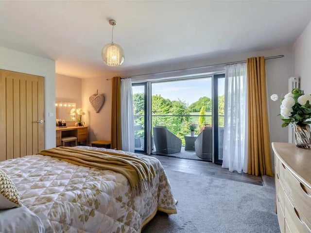The spacious master bedroom suite has a wonderful westerly facing views over Berry Hill Park. There is an alcove area with space for a dressing table, two radiators and tiled flooring immediately in front of the 3.5m wide double glazed windows and central french doors leading out onto the balcony.