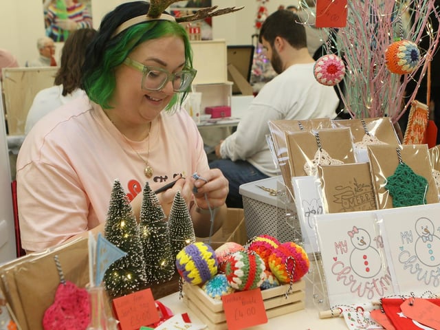 Here is crochet worker Beth Harvey on a Christmas stall.