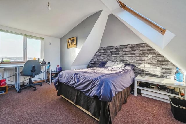 Another generously sized bedroom within the loft conversion on the second floor of the £425,000 Kirkby property. Again it is bright, thanks to windows at the front and back.