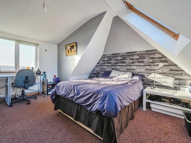 Another generously sized bedroom within the loft conversion on the second floor of the £425,000 Kirkby property. Again it is bright, thanks to windows at the front and back.