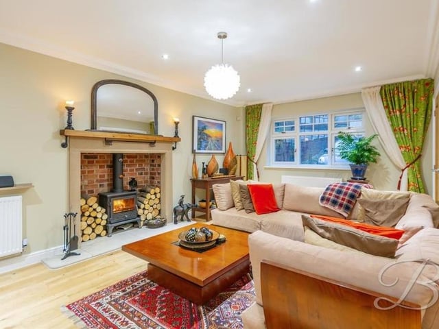 The main reception room at The Park property is this living room, which lends itself perfectly to cosy nights in with the family. The distinctive fireplace features a multi-fuel burner.