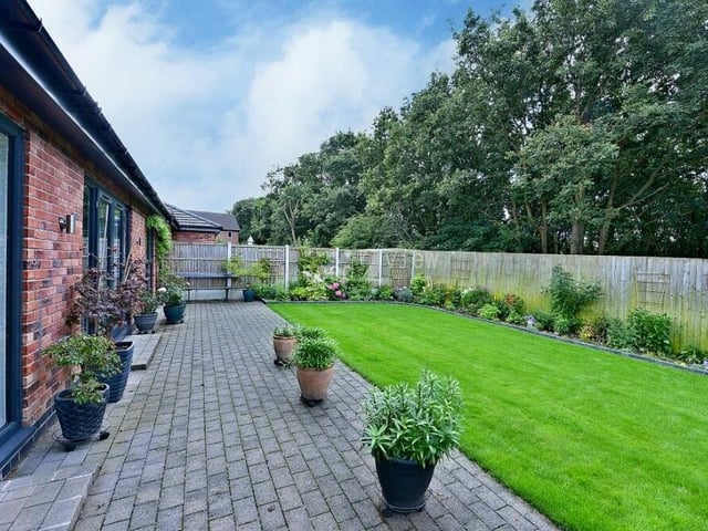 We think you'll agree that the private, enclosed, south-facing garden is expertly presented. A lush lawn is complemented by well-stocked borders and a patio space for relaxing or entertaining friends.