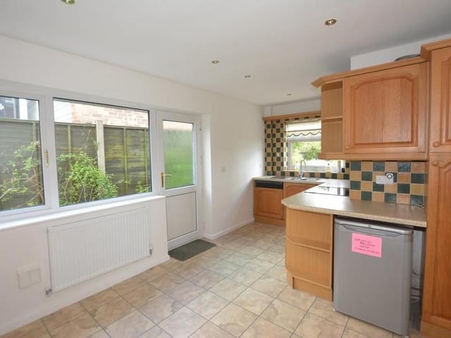 A third shot of the breakfast kitchen, which has space for a fridge freezer, and plumbing for a washing machine. There is also bags of room for a breakfast table. Windows to the back and side of the bungalow let in lots of natural light.