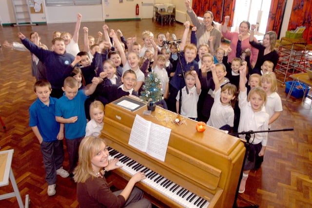 Staff and pupils at Sutton's Leamington School pictured during the recording of their Christmas CD