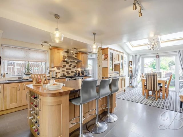 Beautifully maintained three-bedroom semi-detached property, located in the heart of Rainworth Village. Offering a generous layout, modern finishes, and excellent outdoor space, this home is perfectly suited to families, professionals, or those looking to settle in a popular village with a wealth of nearby amenities. The kitchen has been thoughtfully designed for cooking and entertaining, complete with a central island that provides both additional workspace and a casual dining spot.