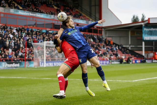 Will Swan challenges during the Sky Bet League 2 match against Walsall FC at the Poundland Bescot Stadium, Saturday 17 Feb 2024  
Photo credit Chris & Jeanette Holloway / The Bigger Picture.media