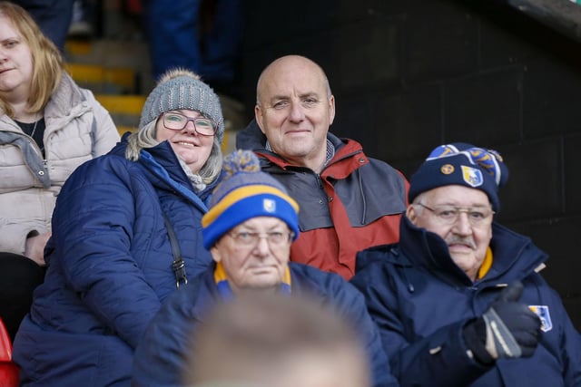 Stags fans watch the Sky Bet League 2 match against Walsall FC at the Bank's Stadium.