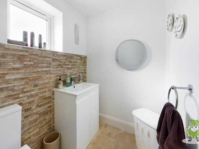 A bathroom/WC on the first floor of the property.