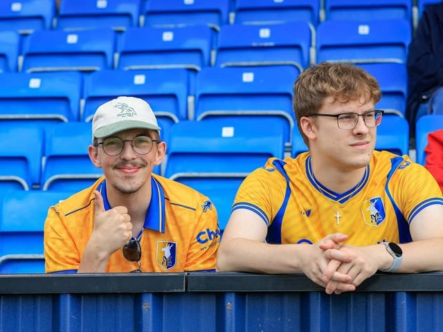 Mansfield Town were beaten after letting a 2-0 half-time lead slip away.