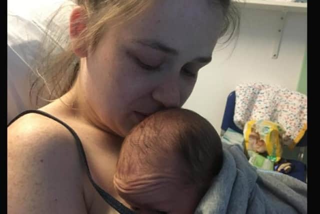Jade with baby Roman shortly after giving birth.