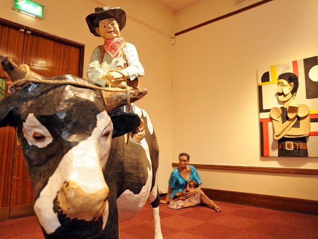 Cowboy vibes at the Phillip Cox papier mache sculpture exhibition at the Mansfield Museum.