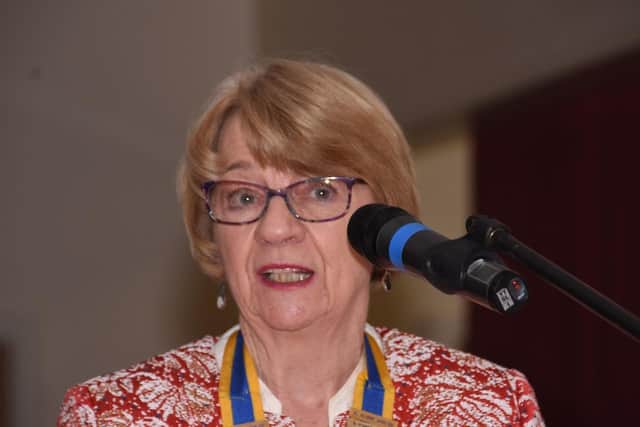 Karen Johnson, Mansfield Rotary president, speaks at the awards.