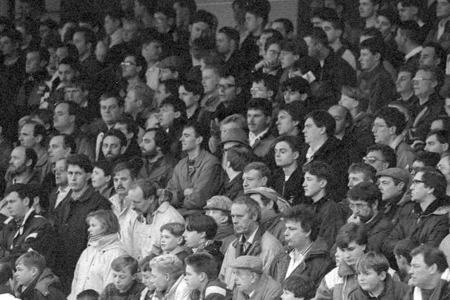 Hartlepool United fans pictured at a  home game in 1991. Who can you recognise?