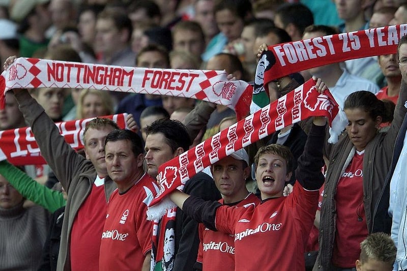 Fans show their respect to Brian Clough as they sing along to the songs played in his honour during the Coca-Cola Championship match between Nottingham Forest and West Ham United at The City Ground on September 26, 2004.