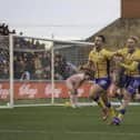 Mansfield Town forward Rhys Oates celebrates his first half goal with team mate Will Evans, during the Sky Bet League 1 match against Bradford City AFC at the One Call Stadium, 01 Jan 2026.   Photo credit, Chris & Jeanette Holloway / The Bigger Picture.media