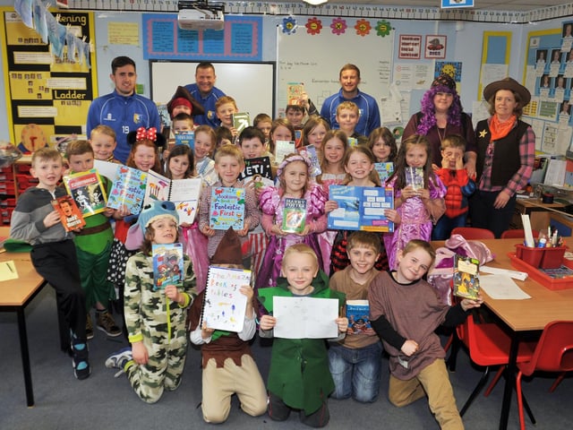 World Book Day at Holly Primary School, Mansfield Town footballers visited the school to listen to the children read in 2014.
