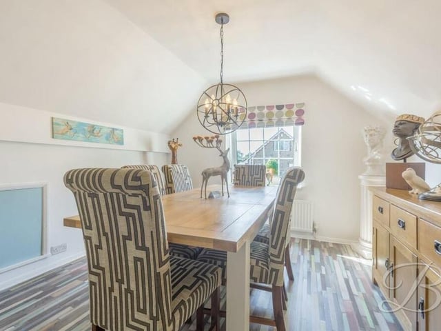 This dining area at the Kirkby bungalow possesses brightness and style.