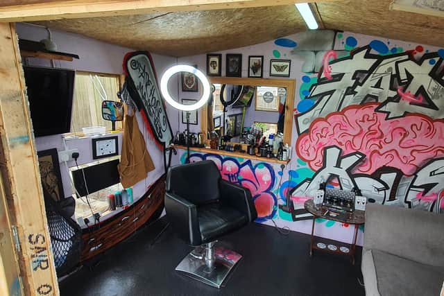 The interior of Aidan's Fade House salon.