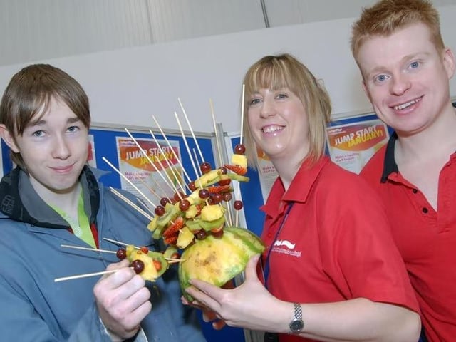 2011 saw student builder Ryan Hudson going for the healthy option during Jumpstart January which was organised by the West Notts College Student Health, Welfare and Safe Guarding department, aiming to promote healthy eating and exercise amongst the construction students at their Logistics Skill Academy. The event was supported by staff from DW Sports Fitness including their assistant manager Oliver Pate, right, also pictured is student advisor Kirsty Betts.