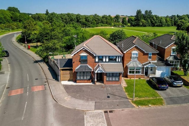 This aerial photo shows how the property sits on a desirable corner plot at Studland Close and backs on to Mansfield Woodhouse's Manor Park. There is plenty of off-street parking space at the front.