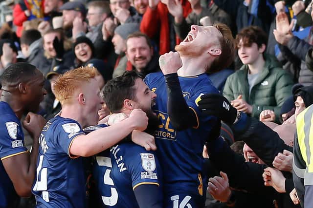 The team celebrate their deflected second half goal at Newport. Photo by Chris Holloway/The Bigger Picture.media