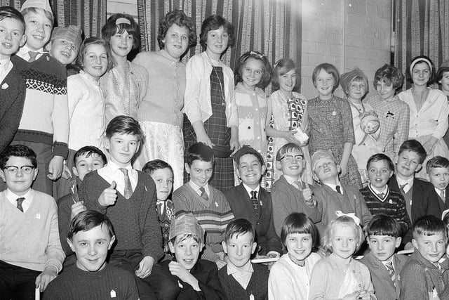 Christmas party time in 1964. Can you spot anyone you know?
