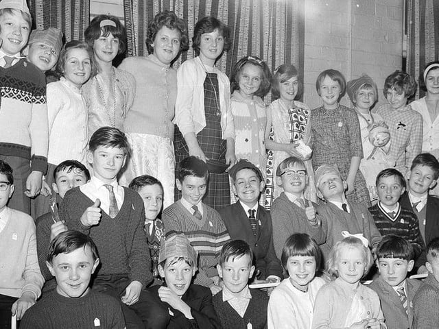 Christmas party time in 1964. Can you spot anyone you know?