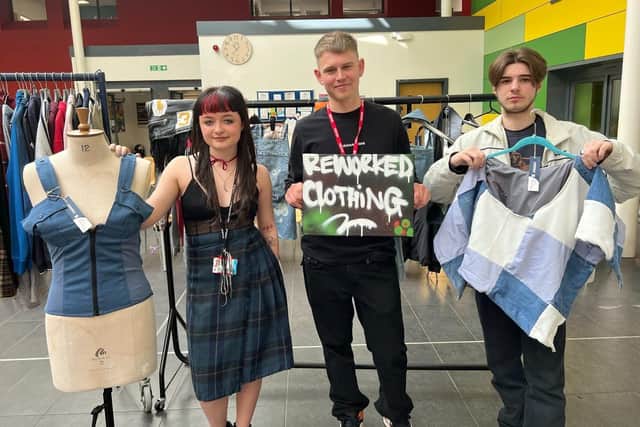 Harry, centre, with students Leila Ashard and Samuel Burrell-Walch at the college's pop-up event.
