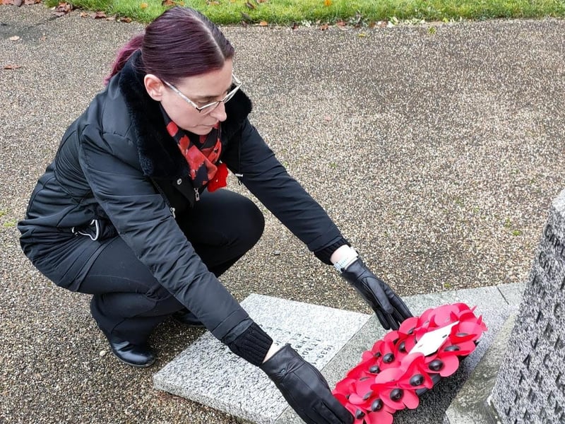 Council deputy leader Coun Helen-Ann Smith lays a wreath at the Stanton Hill war memorial