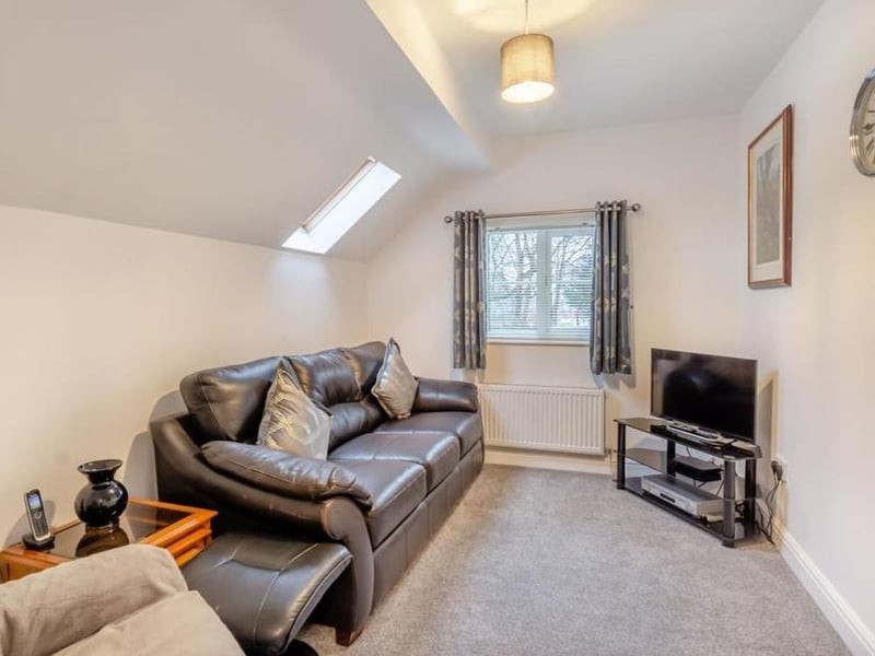 The fourth and final bedroom is a versatile space that could be used an office or study, or just as a relaxing retreat. It includes a Velux roof window.