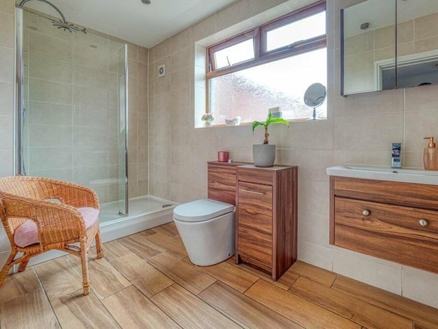 Behind the staircase on the ground floor is this shower room, which has recently been upgraded and is finished to a high standard.