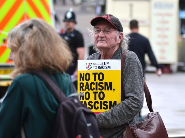 Counter-protestors were present in the market square.