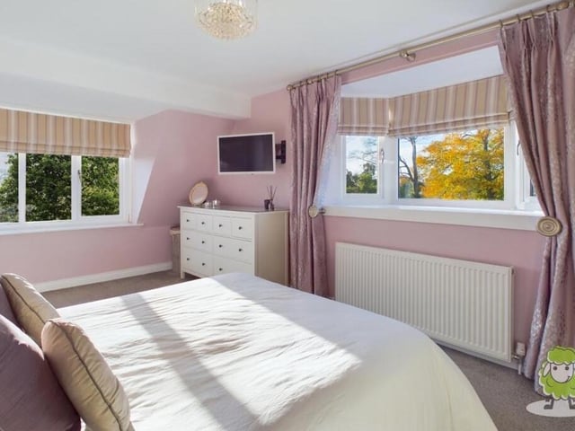 The first bedroom overlooks the side and rear of the Ellesmere Road property.