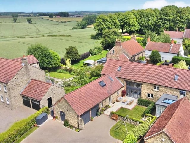 A semi detached stone barn conversion with four bedrooms and three bath/shower rooms, occupying a large south west facing plot with an integral double garage and resin driveway, set back behind electric gates in a delightful semi-rural setting. Contact Richard Watkinson & Partners 01623 306746.