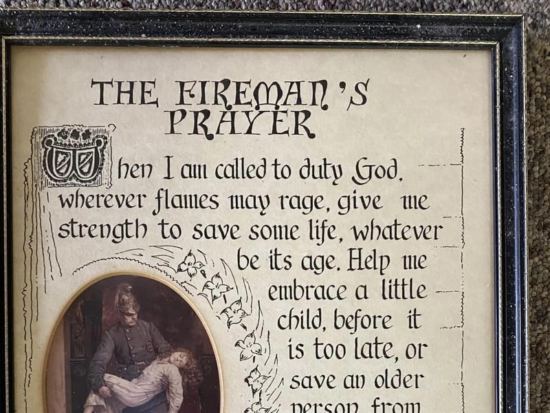A framed copy of The Fireman's Prayer