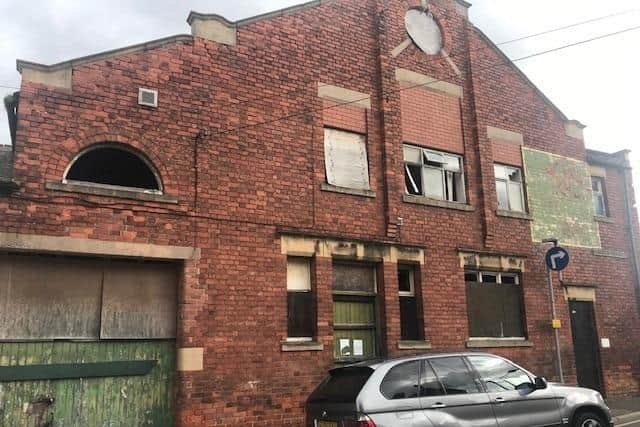 The area for redevelopment is populated by derelict and run-down buildings.