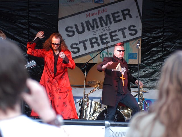 Dr and the Medics take to the stage on Mansfield market place this evening as part of the summer in the streets festivities. Year: 2007.