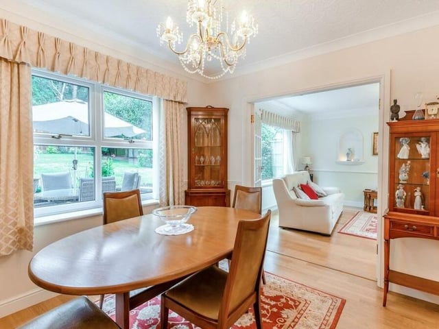Throw open the double doors of the lounge and you find this elegant dining room. It boasts a wood floor, coving to the ceiling, dado rail, two wall-light points and a window to the back of the house.
