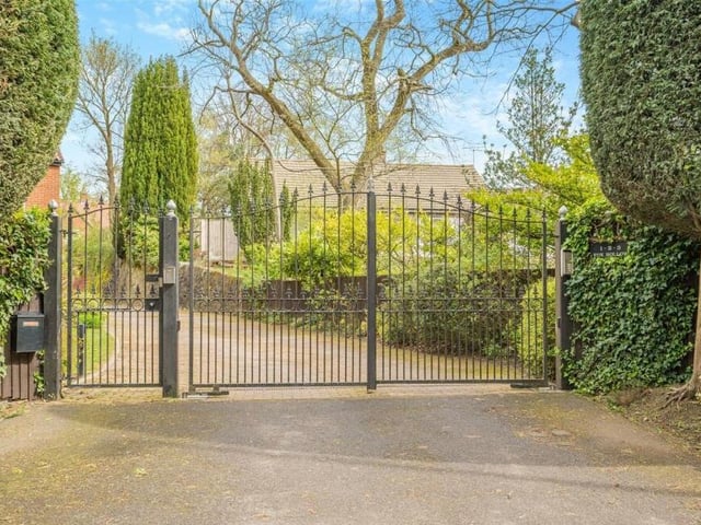 The last photo of our gallery focuses on the remote-controlled, electric gates that open on to the driveway at Fox Hollow. The house is set well back and hidden from Longdale Lane as part of a small development consisting of just three properties.